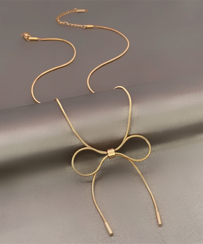 Collar de princesa con lazo dorado en plata de ley para mujer