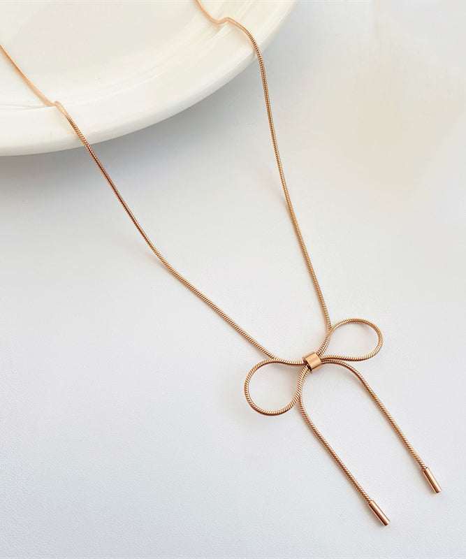 Collar de princesa con lazo dorado en plata de ley para mujer