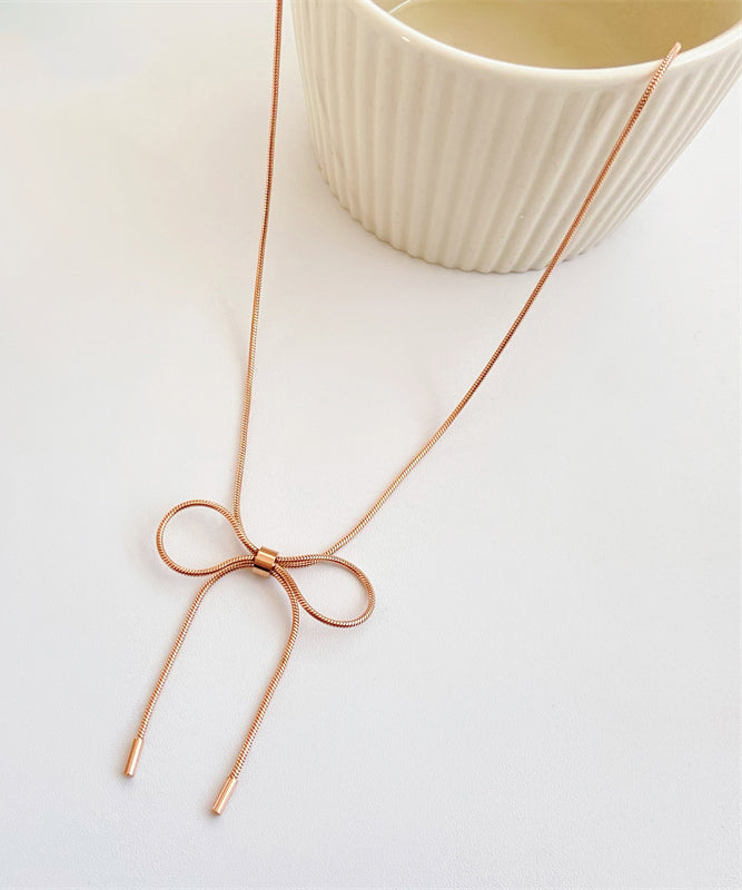 Collar de princesa con lazo dorado en plata de ley para mujer