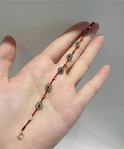 Frauen Rotes Handstrickperlenarmband