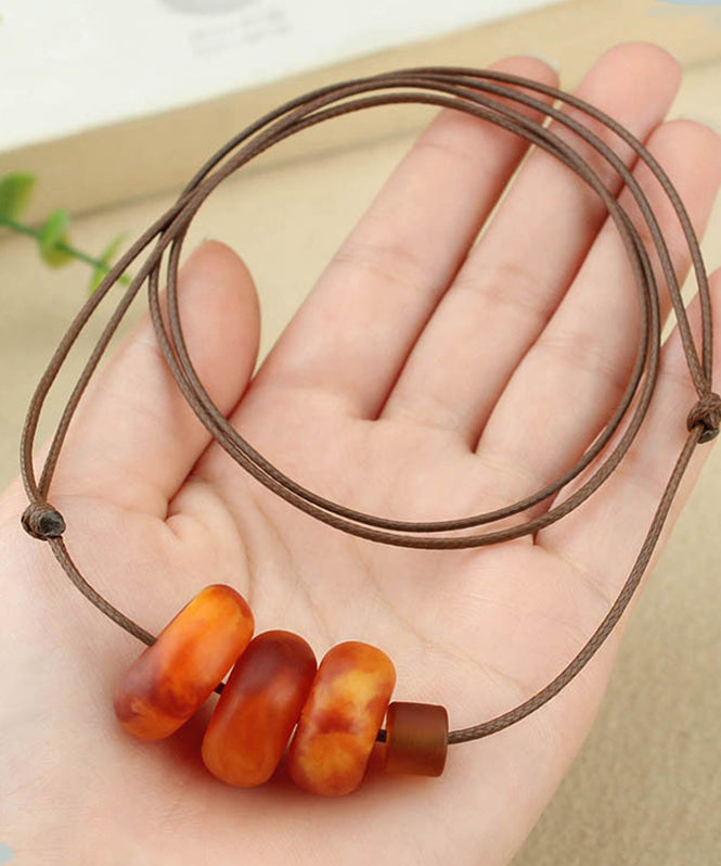 Halskette mit Anhänger aus Bienenwachs und rotem Harz für Damen