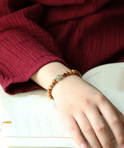 Pulsera de cuentas de caoba y jade amarillo para mujer