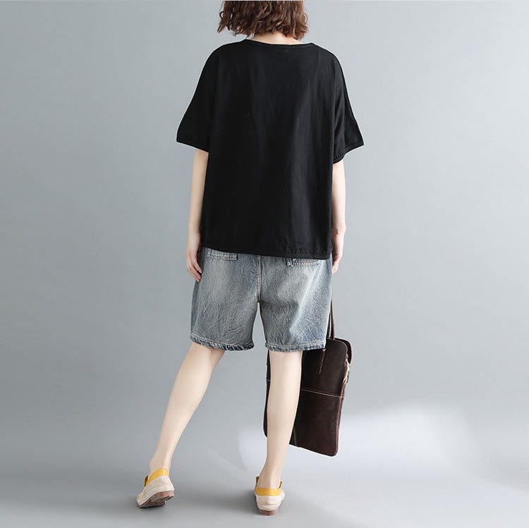 Damen schwarz bedruckte Baumwolltops Damenblusen Boutique-Tops O-Ausschnitt Taschen Midi-Shirt