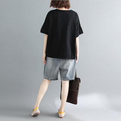 Damen schwarz bedruckte Baumwolltops Damenblusen Boutique-Tops O-Ausschnitt Taschen Midi-Shirt