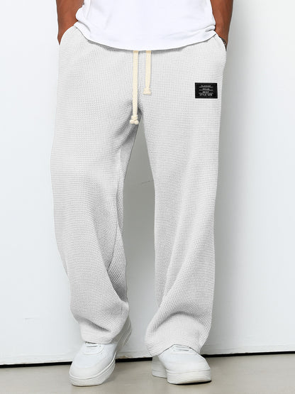 Men's Casual Waffle Embroidered Logo Simple Solid Color Trousers