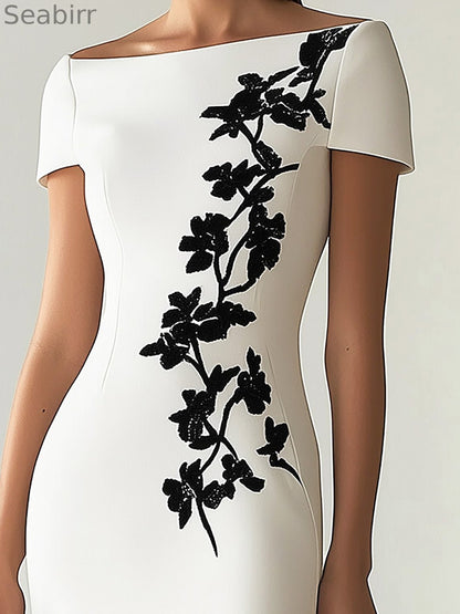 Chic Boatneck Dress with Asymmetrical Floral Print