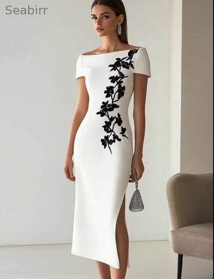 Chic Boatneck Dress with Asymmetrical Floral Print